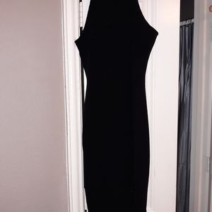 Black and a White fitted halter dresses. Super sexy!!